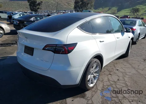 2023 Tesla Model Y Awd/Long Range Dual Motor All-Wheel Drive z USA, uszkodzony, nr VIN 7SAYGDEE9PA183212